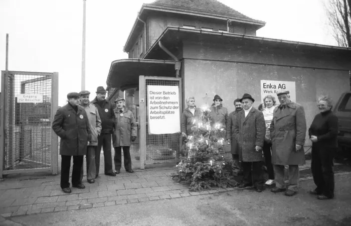 Framed Print : Worried about their jobs, workers and employees occupied their company