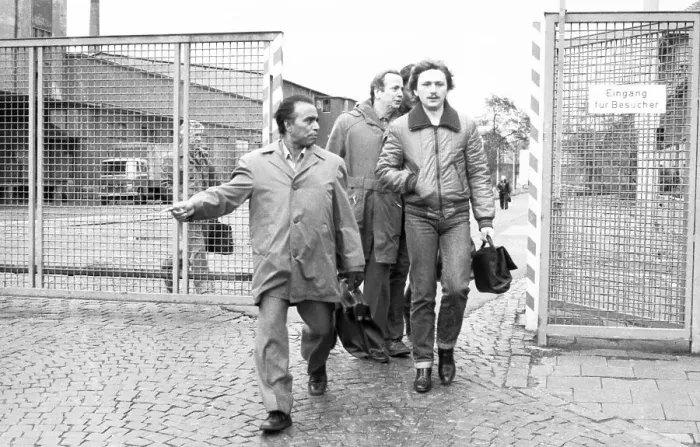 Framed Print : Worried about their jobs, workers and employees occupied their company