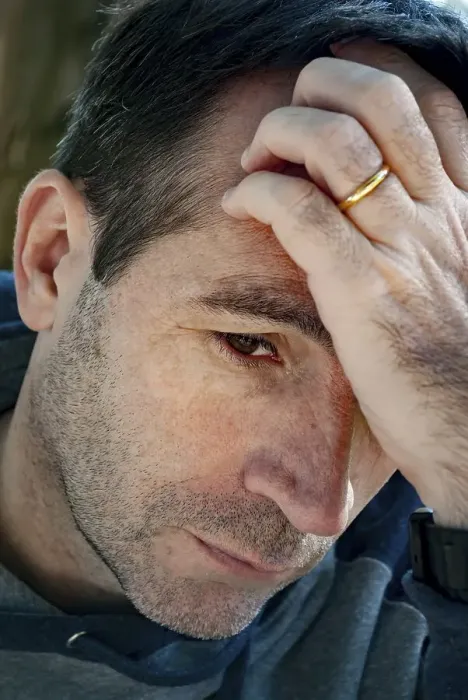 Framed Print : Worried man thinking with his hand on his forehead