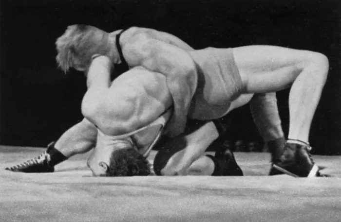 Framed Print : Wrestling, he two-time Olympic champion Palusalu (Estonia) pushes Hornfischer (Germany) into the bridge