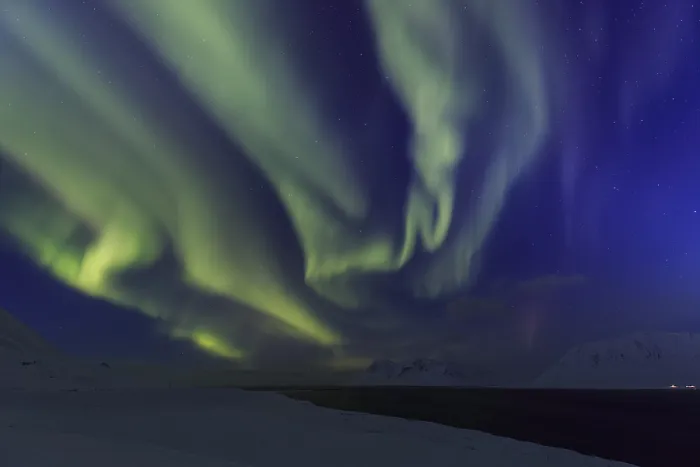Framed Print : Yellow and green northern lights over snowy mountains