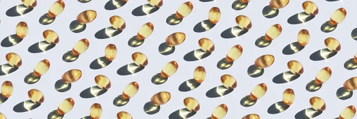 Framed Print : Yellow omega 3 capsule pattern