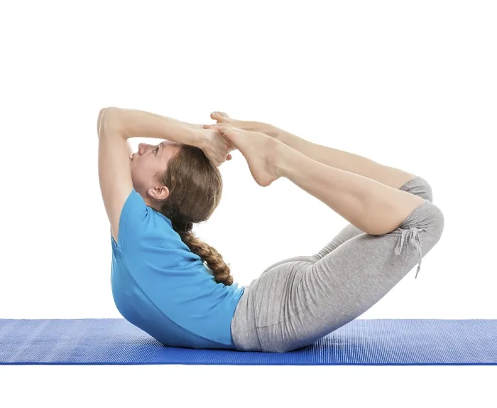 Framed Print : Yoga, young beautiful slender woman yoga instructor doing Bow pose (Balancing on abdomen in the shape of a bow) Framed Print : Yoga, young beautiful slender woman yoga instructor doing Bow pose (Balancing on abdomen in the shape of a bow)