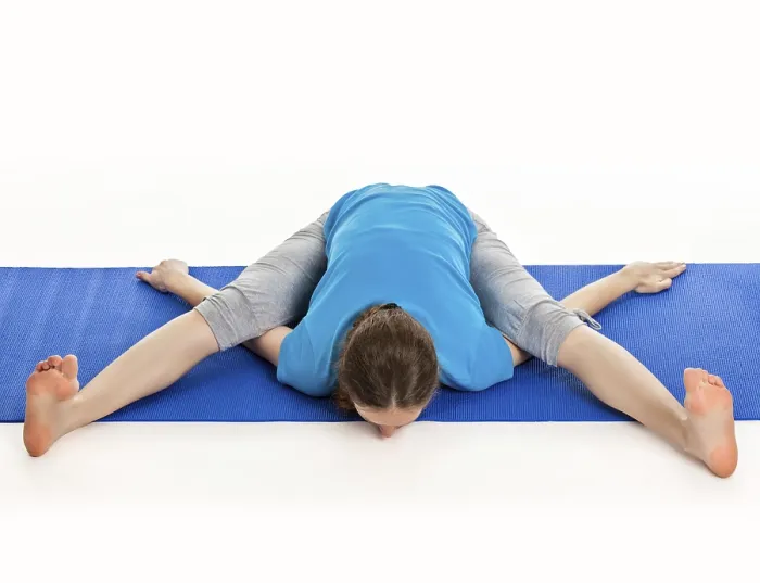 Framed Print : Yoga, young beautiful slender woman yoga instructor doing Tortoise Pose (Kurmasana)