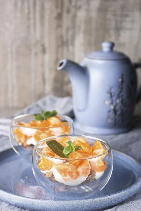 Framed Print : Yogurt with oatmeal cookies and tangerine slices in glass cups