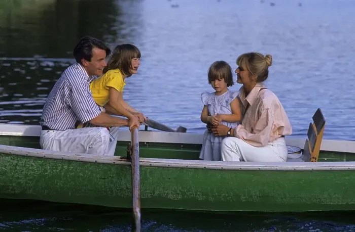 Framed Print : Young family with 2 two children in a rowing boat