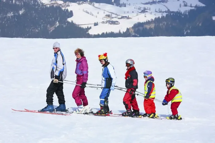 Framed Print : Young family skiing, Reiteralm