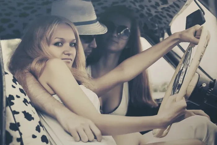 Framed Print : Young fashion people driving vintage car