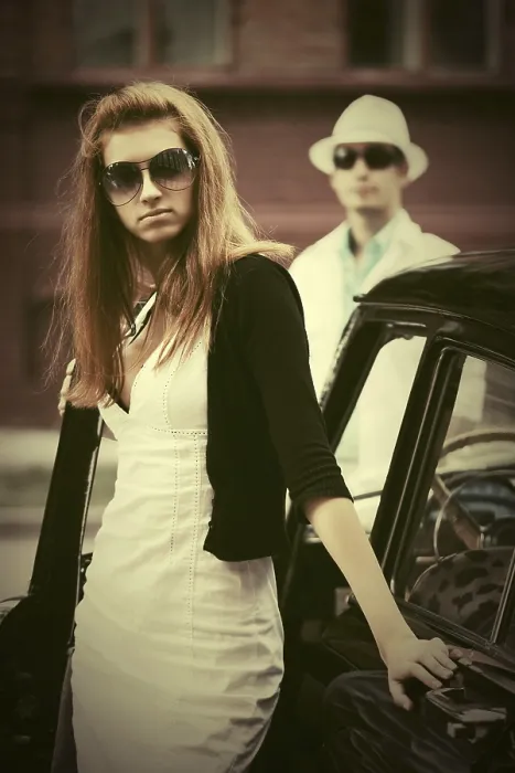 Framed Print : Young fashion woman in sunglasses next to vintage car