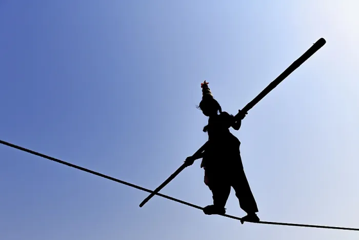 Framed Print : Young girl balancing on rope, balancing act