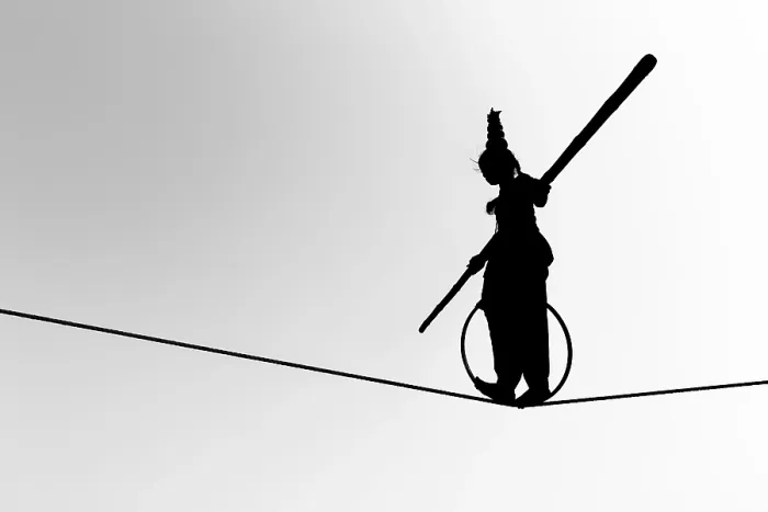 Framed Print : Young girl balancing a on rope in silhouette Framed Print : Young girl balancing a on rope in silhouette