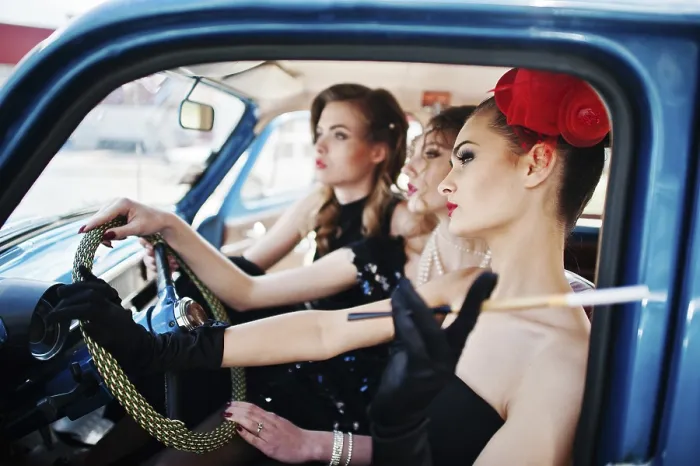 Framed Print : Three young girl in retro style dress seat on old classic vintage car Framed Print : Three young girl in retro style dress seat on old classic vintage car