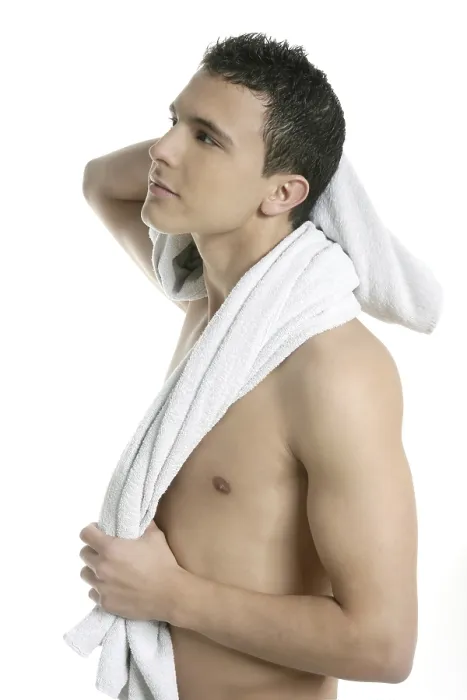 Framed Print : Young handsome man after bath with white towel isolated Framed Print : Young handsome man after bath with white towel isolated