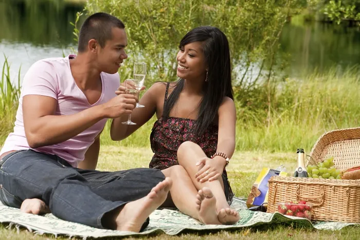 Framed Print : Young happy asian couple enjoying their time outdoors