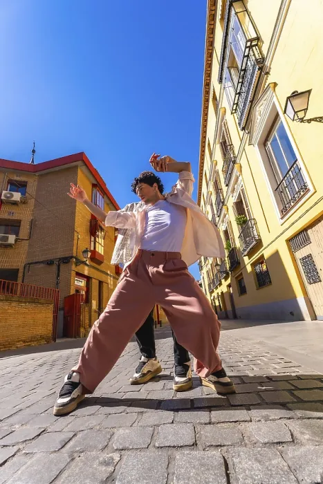 Framed Print : Young man actively dancing a contemporary urban street performance