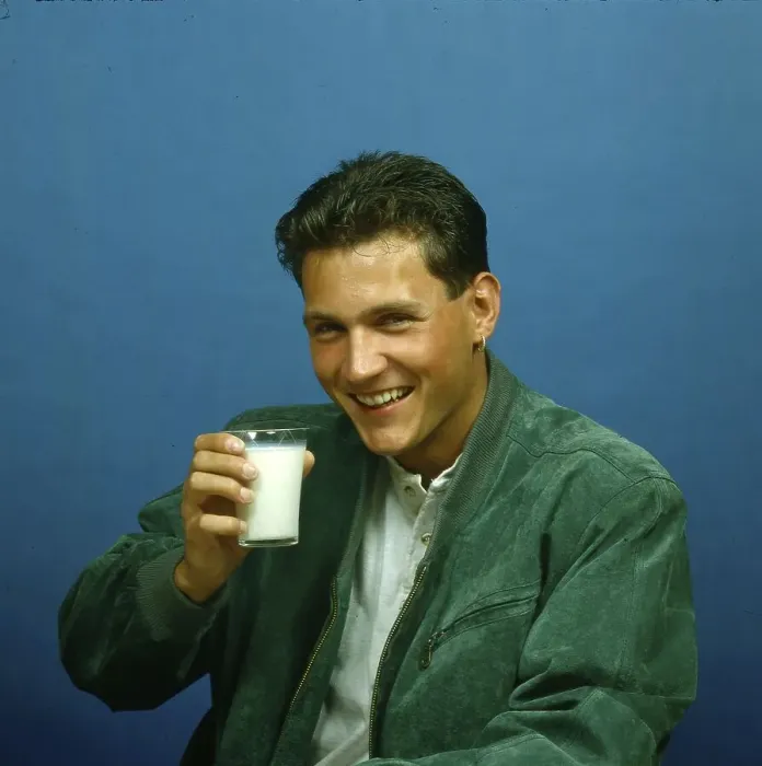 Framed Print : Young man with milk glass Framed Print : Young man with milk glass