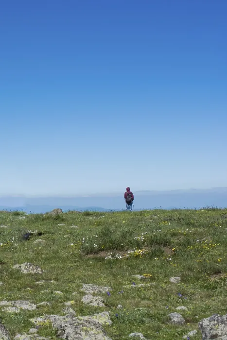 Framed Print : Young man taking an excursion on a mountain