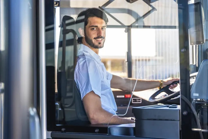 Framed Print : Young man working as a bus driver Framed Print : Young man working as a bus driver