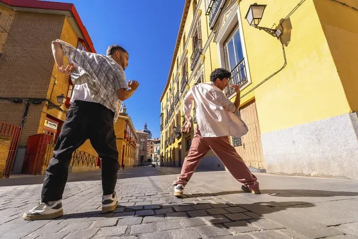 Framed Print : Two young men expressing themselves through street dance movement