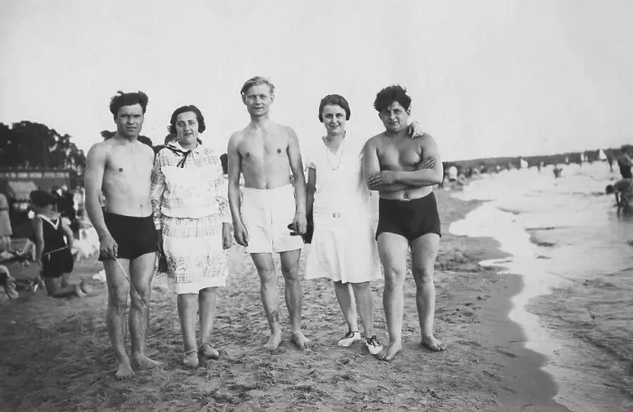 Framed Print : Five young people on the beach