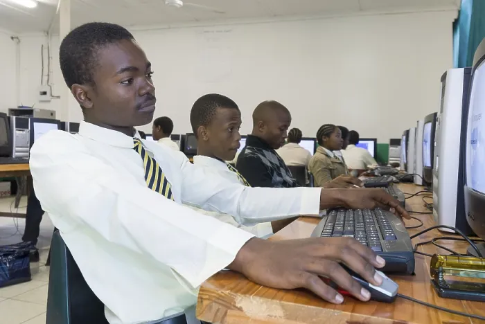 Framed Print : Young people working on computers