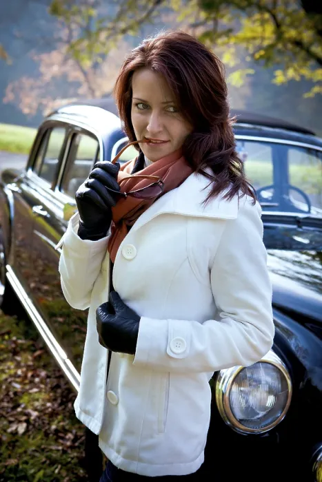 Framed Print : Young woman at a Mercedes Ponton 220SE built in 1959