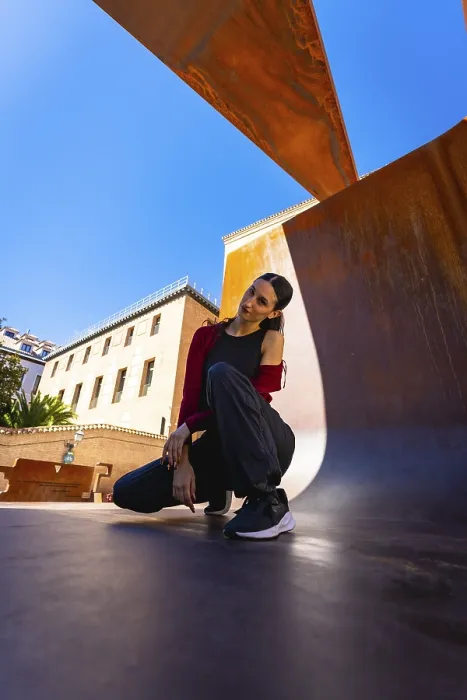 Framed Print : Young woman posing in a modern city environment Framed Print : Young woman posing in a modern city environment