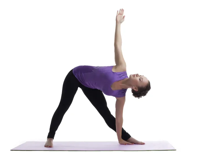 Framed Print : Young woman posing in yoga asana on rubber mat isolated Framed Print : Young woman posing in yoga asana on rubber mat isolated