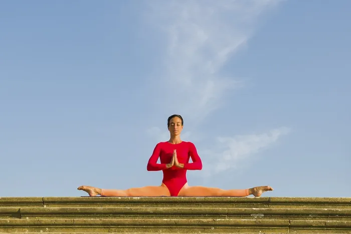 Framed Print : Young woman practising Hatha yoga