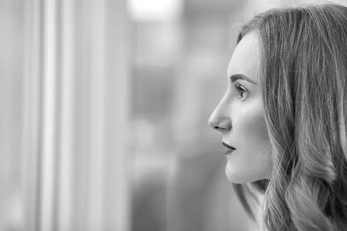 Framed Print : Serious young woman profile with copyspace