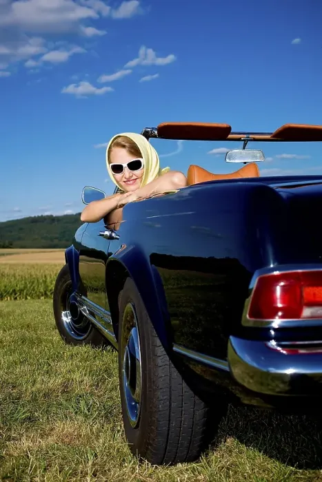 Framed Print : Young woman sitting in a Mercedes MB W113 230SL Framed Print : Young woman sitting in a Mercedes MB W113 230SL