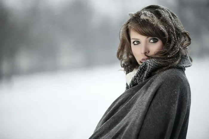 Framed Print : Young woman in snow, portrait