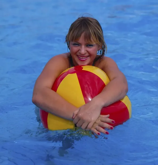 Framed Print : Young woman with water polo swimming pool