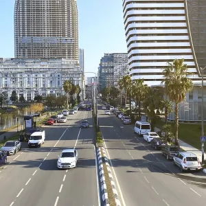 10.02.2025, Batumi, Georgia: A wide urban boulevard lined with palm trees