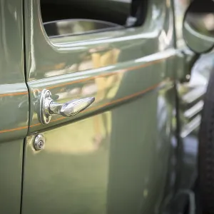 Detail abstract of beautiful vintage car door and handle Detail abstract of beautiful vintage car door and handle