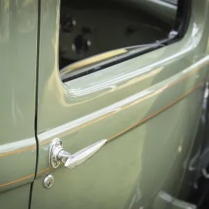 Detail abstract of beautiful vintage car door and handle Detail abstract of beautiful vintage car door and handle