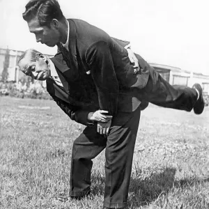 Two acrobats training, 1920s, Germany, Europe Two acrobats training, 1920s, Germany, Europe