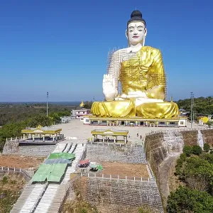Aerial of a giant sitting buddha below the Kyaiktiyo Pagoda Aerial of a giant sitting buddha below the Kyaiktiyo Pagoda