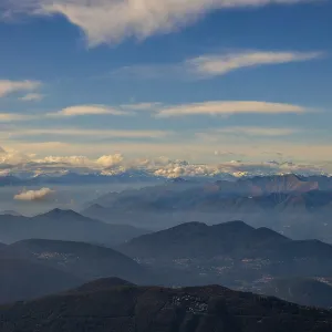 Aerial View over a Beautiful Mountainscape and And Snow Capped Mountain