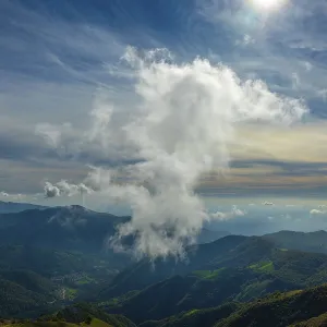 Aerial View over Beautiful Mountainscape with Clouds in a Sunny Day From Monte Generoso Aerial View over Beautiful Mountainscape with Clouds in a Sunny Day From Monte Generoso