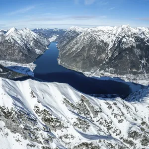 Aerial view, epic view of mountain landscape with snow in winter