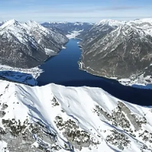 Aerial view, epic view of mountain landscape with snow in winter