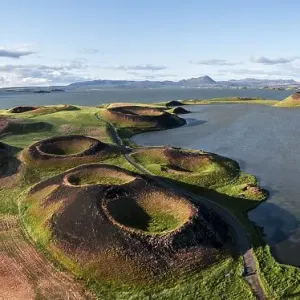 Aerial view of green volcanic crater Aerial view of green volcanic crater