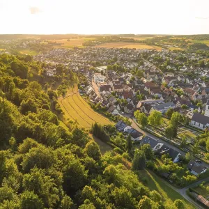 Aerial view of a hilly landscape with dense forest Aerial view of a hilly landscape with dense forest