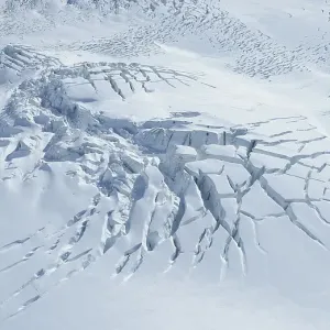 Aerial view, ice field with cross crevasses Aerial view, ice field with cross crevasses