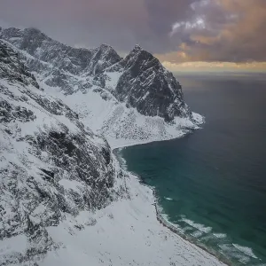 Aerial view, Kvalvika beach in winter with snow Aerial view, Kvalvika beach in winter with snow