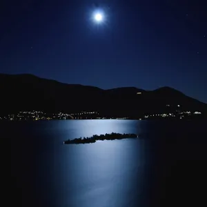 Aerial View with Moon Light Reflected over an Alpine Lake Maggiore with Brissago Islands