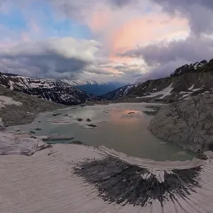 Aerial view over the Rhone glacier with the glacial lake Aerial view over the Rhone glacier with the glacial lake