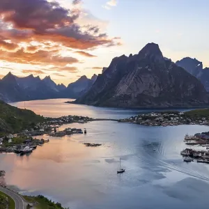 Aerial view, sunset at Reinefjord with mountains Aerial view, sunset at Reinefjord with mountains