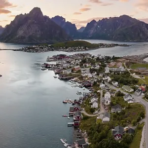 Aerial view, sunset at Reinefjord with mountains Aerial view, sunset at Reinefjord with mountains